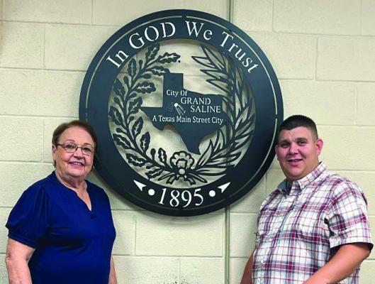 Grand Saline City Council member Kathy Smith recently donated an ‘In God We Trust’ seal to the city of Grand Saline. The donation was announced during the council’s regular monthly meeting in July. The council recognized Smith unanimously for her design of the seal and the placement of the seal in the city council chamber. The seal was made and installed by Taylor Made Custom Fabrication in Grand Saline. Shown with Smith is Grand Saline Mayor Ridge Tardy. Courtesy photo