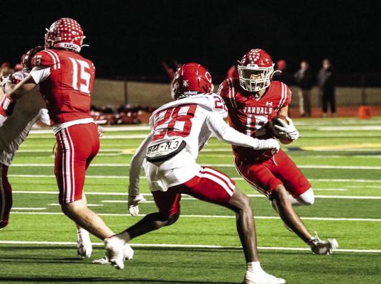Chris Fabian, the Van Vandal senior running back, carried the ball eight times for 56 yards rushing Dec. 6 against the Carthage Bulldogs in Longview. The Vandals lost to Carthage, 53-14, to end their season with an overall record of 10-4 as they made the Class 4A, Division 2, state quarterfinals for the third time in school history. Photos by Jillian Veader/v8r Photography