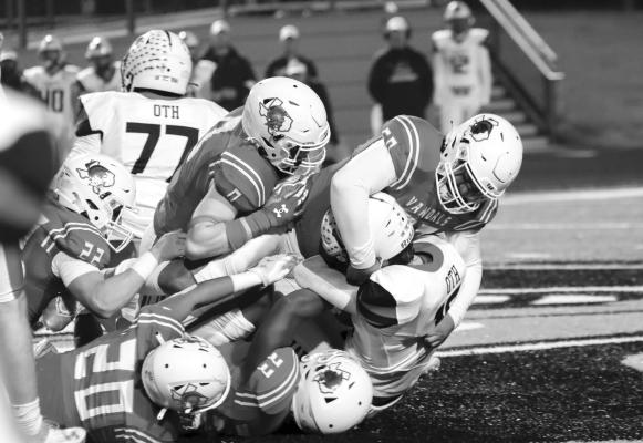 A host of Van Vandal defenders (dark uniforms) bring down an Aubrey Chapparal defender during a running play in the Nov. 17 Class 4A, Division 2, Area Championship game played at Royse City. Among those in on the tackle were Armando Lozano (50), Logan Fattig (0), Colton Miller (20), and Tuff Arozamena (22).The Vandals’ season came to a close at the hands of Aubrey, 35-14. Van finished their 2023 season at 8-4. Photo courtesy of Jillian Veader of the Van High School Journalism Department