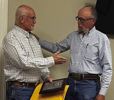Former Edgewood mayor Steve Steadham was presented a plaque of service for his 10 years serving as mayor. Presenting the plaque was newly elected mayor Louis Dunn.  Courtesy photo