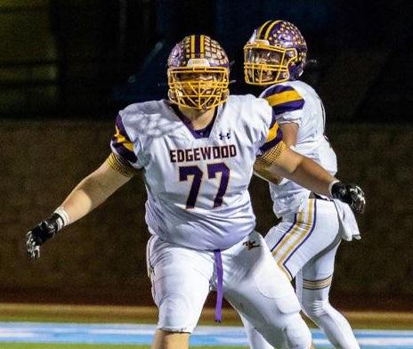 Senior lineman Layton Bass (77) provides a wall of protection for Edgewood quarterback Hayden Wilcoxson in the regular season finale Nov. 3.