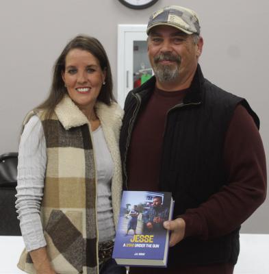 J. R. Wray recently announced the release of his debut novel, ‘ Jesse: A Star Under the Sun.’ The book invites readers into the wildlife of an imaginative character who navigates the trials and tribulations of growing up. Standing with Wray is his wife, Kristie, who played a pivotal role in his writing journey. Photo by Bodey Cooper
