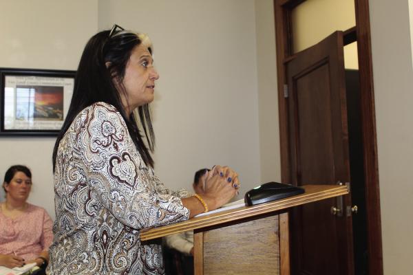 Jessica DeVille, a Van Zandt County citizen, was one of several speakers that shared their views about the proposed purchase of the Paul Michael building during the regular meeting of the VZC Commissioners Court Nov. 5. The commissioners’ court approved the purchase in a 3-1 vote. Photo by David Barber