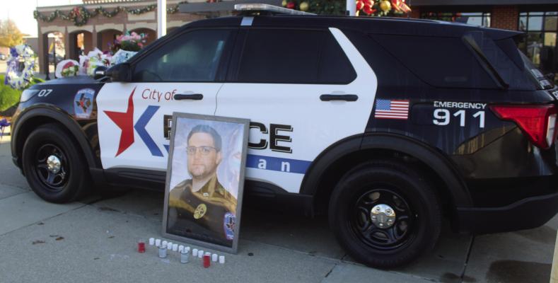 The City of Kaufman Police Department set up a memorial out front of their station for Austin Cooley, who was killed in a motor vehicle crash in the early morning hours of Monday, Dec. 8. Photo by Bodey Cooper