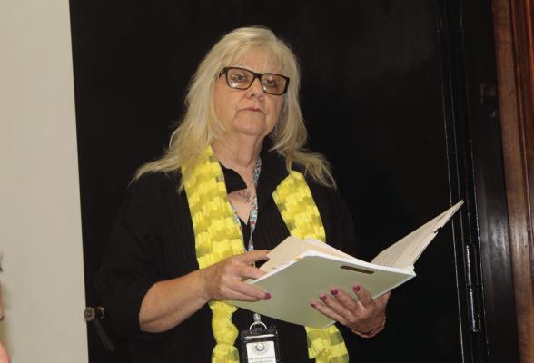 Van Zandt County Auditor Sandy Hill the renewal of the Title IV-E County Legal Services contract during the Aug. 16 regular meeting of the VZC Commissioners Court. The recommendation by Hill was approved unanimously by the commissioners’ court. Photo by David Barber