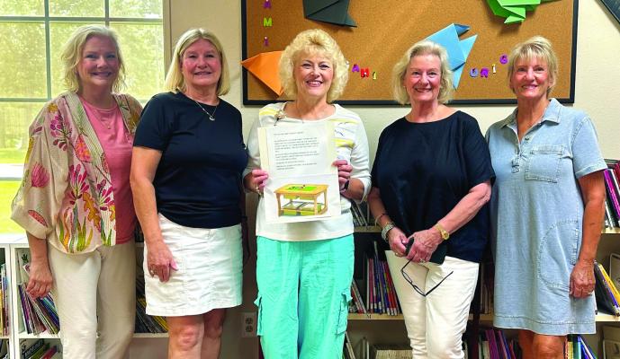 The Van Zandt County/Sarah Norman Library recently announced the donation of a table for the children’s area of the library in honor of Kathleen Stanford Barber on her 100th birthday on July 5. Standing with VZC/Sarah Norman Library Director Tonja Garten were Kathleen Stanford Barber’s daughters: Ann Miller, Elaine Gothard, Julia Beazer, and Carol Baumgarner. Courtesy photo
