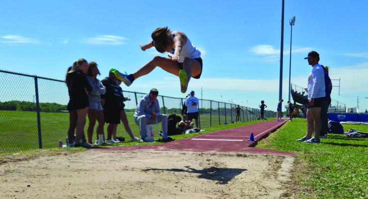 Cassidy Kafka competed in both the high and long jump events at the District 13-4A Meet. Kafka would place fourth overall in the long jump to advance to the Area Meet. Photoa by David Kapitan
