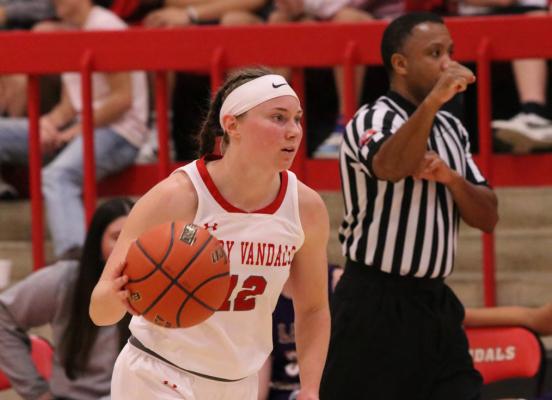Point guard Mikyla Bachert kept the Van Lady Vandal offense running at a high level against Cumberland Academy Dec. 13, dishing out eight assists in a 66-10 rout of the Knights. Photo by Liz Hinch