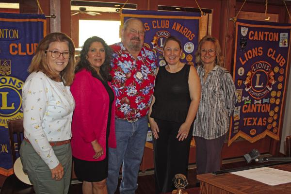 Canton Lions Club President Sandy Sims, center, presented ‘Certificates of Appreciation’ to Children’s Advocacy Center of Van Zandt County (CACVZ) Executive Director Amparo Mahler, second from left, and Board President Jana Deen Massey, second from right, at the conclusion of the Canton Lions Club Luncheon April 1. Also shown were Canton Lions Club Members Cindy Malouf, far left, and Tonda Curry, far right. Photo by David Barber