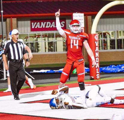 Van Vandal linebacker Beau Barton (14) celebrates a safety scored by the Vandal defense Sept. 2 during first half action against Chapel Hill. The Vandals moved to 2-0 in the young season after outlasting Chapel Hill, 23-17, in Van’s home opener.