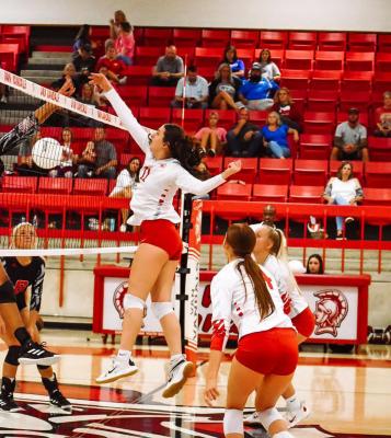 Shelby Burns (11) and the rest of the Lady Vandals will look to move closer to another playoff berth this week with road dates in Tyler at Cumberland Academy Sept. 27 and at Canton Sept. 30. Photo by Liz Hinch
