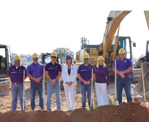 Edgewood ISD Superintendent Kristin Prater (center) and members of the Edgewood School Board prepare to shovel some dirt during a Groundbreaking Ceremony Aug. 5 for Phase 1 of the school district’s bond project. Phase 1 of the bond project involves the PK-2 building that includes the new K-8 cafeteria. Phase 1-B of the project involves the CTE building, and that groundbreaking is scheduled to take place later this month. Additional photos on 6A. Courtesy photo