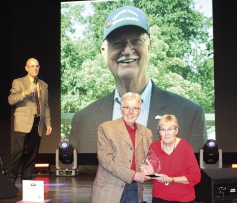 Former Van Zandt County Pct. 2 Commissioner Virgil Melton Jr. was remembered with a tribute during the Republican Club of VZC Gala Feb. 6 at Victory Life Church in Ben Wheeler. Texas Lt. Governor Dan Patrick, who served as the guest speaker during the Gala, presented the Legacy Award to Melton’s widow, Janice. Melton died in June 2024 following a car accident. Photo by Susan Harris