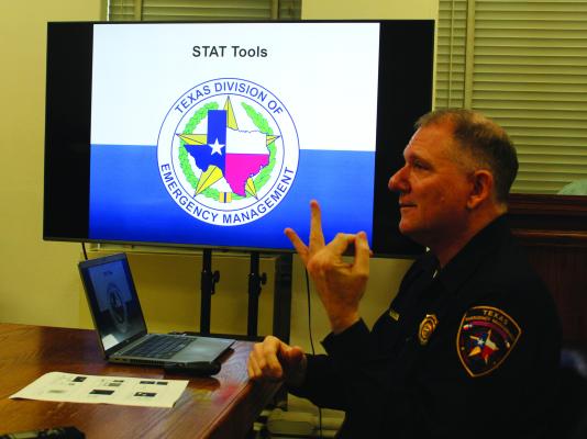 Ken Bell with the Texas Emergency Management Division (TEMD) spoke during an emergency session of the Van Zandt County Commissioners Court June 3 about the process of reporting damage caused by recent storms in VZC. Photo by David Barber