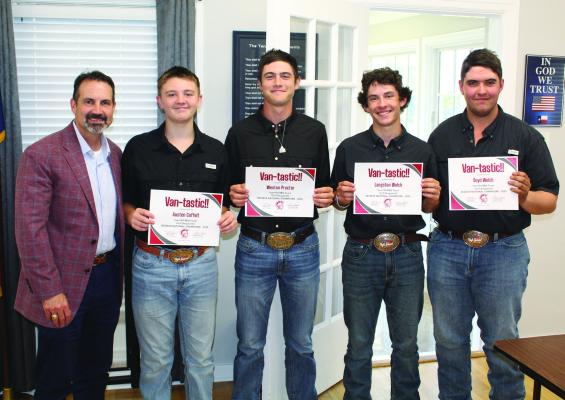 The Van High School Future Farmers of America (FFA) BBQ Cooking Team known as ‘The Grill Sergeants’ were recognized by the Van School Board Sept. 15 during its regular monthly meeting for being named as the 2025 Reserve National Champion FFA BBQ Cooking Team. Van ISD Superintendent Don Dunn (far left) presented each team member with a ‘Vantastic’ award. Team members included left to right, Austin Coffelt, Weston Proctor, Langston Welch, and Boyd Welch. Photo by David Barber