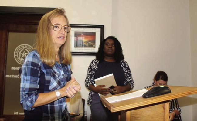 Shannon Barber (right) was introduced as Van Zandt County’s first Civil Assistant District Attorney during the Oct. 11 regular meeting of the VZC Commissioners Court. Barber was introduced by VZC Criminal District Attorney Tonda Curry. Photo by David Barber