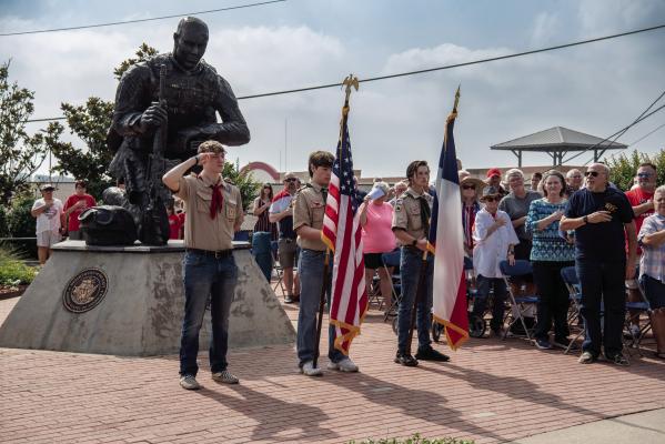 Members of Boy Scout Troop 378 presented the colors to open the annual Memorial Day program May 27 at the Van Zandt County Veterans Memorial in Canton. Photos by Faith Caughron