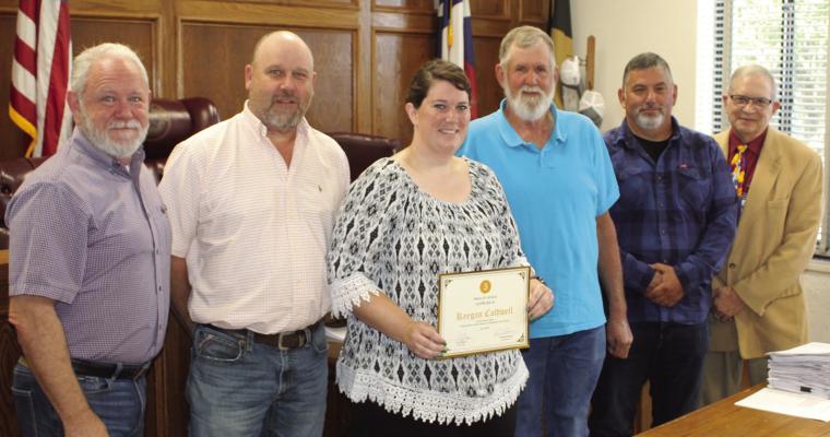 Van Zandt County Commissioners Court Administrator Keegan Caldwell was recognized for her five years of service in VZC by members of the commissioners’ court. Shown with Caldwell were left to right; VZC Pct. 2 Commissioner Cliff Williams, VZC Pct. 4 Commissioner Brandon Barton, VZC Pct. 3 Commissioner Bobby Phillips, VZC Pct. 1 Commissioner Mitch Curtis, and VZC Judge Andy Reese. Photo by David Barber