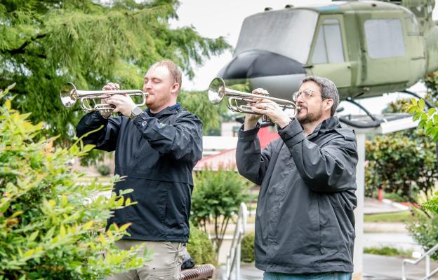 Spencer Pennington (left) and Bennett Potter played ‘Taps’ to conclude the Annual Memorial Day Program May 26 at the Van Zandt County Veterans Memorial in Canton. Photo by Faith Caughron