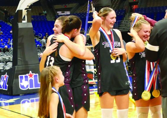 During the post-game Gold Medal ceremony, members of the Martins Mill Lady Mustangs became emotional after winning their second consecutive Class 2A, Division 2, State Championship Feb. 27 with a thrilling 43-41 overtime victory over Farwell in San Antonio. Among the players shown receiving their Gold Medals were left to right, Ruthie Mein, Kara Nixon, McKenna Wise, and Allison Vaughan. Additional photos on 10A. Photo courtesy of the Martins Mill High School Journalism Department