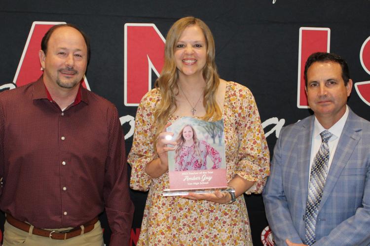 Amber Guy was named as the 2022-23 ‘Teacher of the Year’ at Van High School May 9 during ceremonies at the Hideaway Lake Clubhouse near Lindale. Standing with her were former VHS Principal Jeff Hutchins and Van ISD Superintendent Don Dunn. Photo by David Barber
