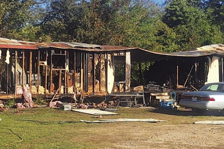 Three children lost their lives in a structure fire early in the morning on Oct. 21 in the Canton area. A fourth child and an adult were taken to the hospital. The cause of the fire was unknown at press time. Photo by Melody Tarno-Thompson