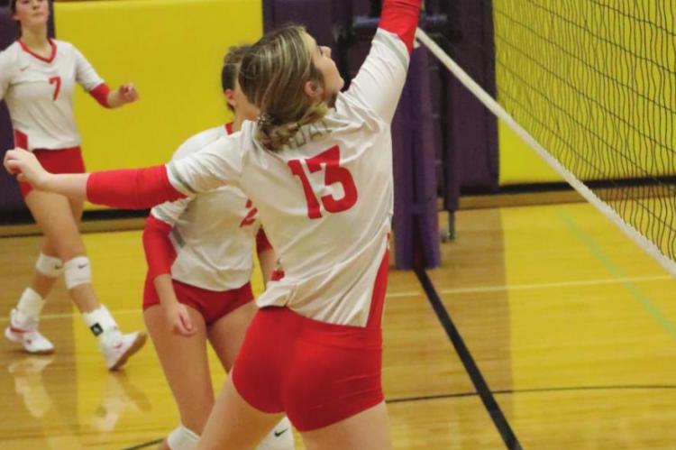 Macie Hansel pushed the ball back over the net during Van’s three-set win over Blue Ridge in the semifinals of the Edgewood Varsity Tournament. Photo by David Kapitan