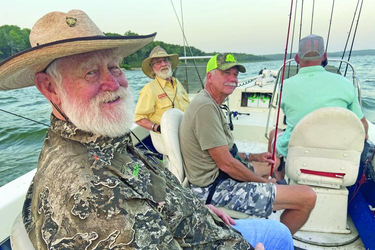 Luke and some great friends, Larry Weishuhn aka. “Mr. Whitetail in foreground, Bill Carey, Jeff Rice and our guide Todd Mehalko enjoyed some great striper fishing last week at Lake Texoma with Striper Express. Photo by Luke Clayton