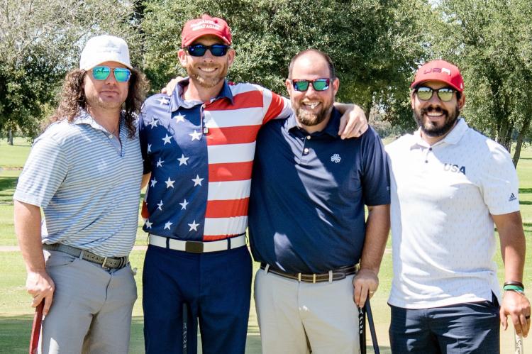 Thomas Beckham, Craig Trevino, Craig Goff and Beau Williams carded a 54 to win first overall at the annual Veterans Memorial Golf Tournament. Photo by Faith Caughron