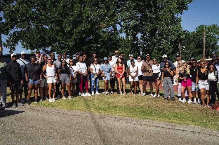 Among the thousands of visitors during First Monday Weekend over the Fourth of July holiday were members of the University of Colorado football coaching staff and their families led by Head Coach Deion Sanders. Courtesy photo