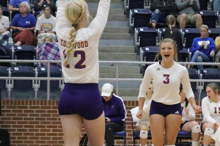 Sophomores Gracie Cates (12) and Brilee Ditto (3) celebrate after an Edgewood point during the team’s run at the Hardman-Watson Tournament in Wills Point. Photo by David Kapitan