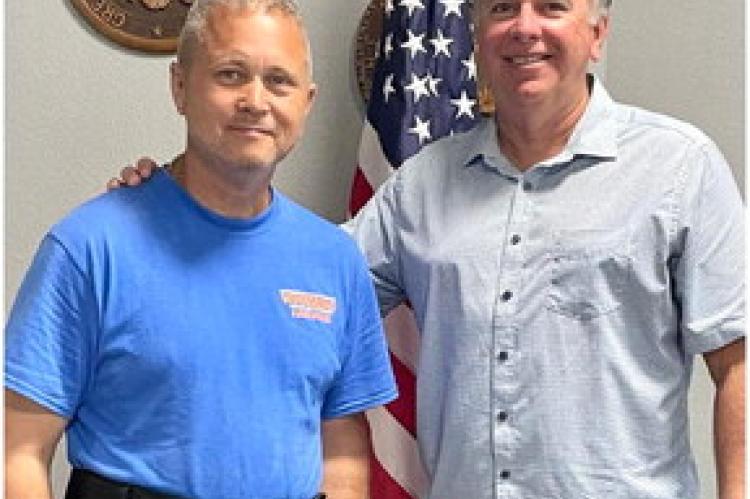 U.S. Army Veteran John Mumby, left, stopped by the Wills Point City Council meeting Oct. 11 to speak about his walk across the state to raise awareness for Gulf War Illness. Mumby began his journey in Waskom, and is anticipating reaching El Paso by mid-December. Courtesy photo