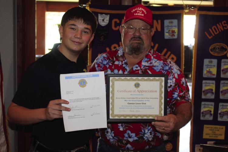 Grand Saline High School freshman Bryson Richey delivered a speech on ‘Soil Stewardship’ May 13 during the weekly Canton Lions Club Luncheon at the Van Zandt Country Club. Richey serves as the GSHS FFA (Future Farmers of America) Vice-President. Following his presentation, Richey received a ‘Certificate of Appreciation’ from Canton Lions Club President Sandy Sims. Photos by David Barber