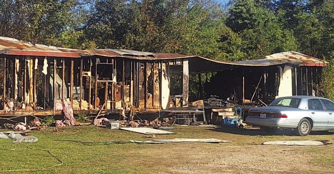 Three children lost their lives in a structure fire early in the morning on Oct. 21 in the Canton area. A fourth child and an adult were taken to the hospital. The cause of the fire was unknown at press time. Photo by Melody Tarno-Thompson